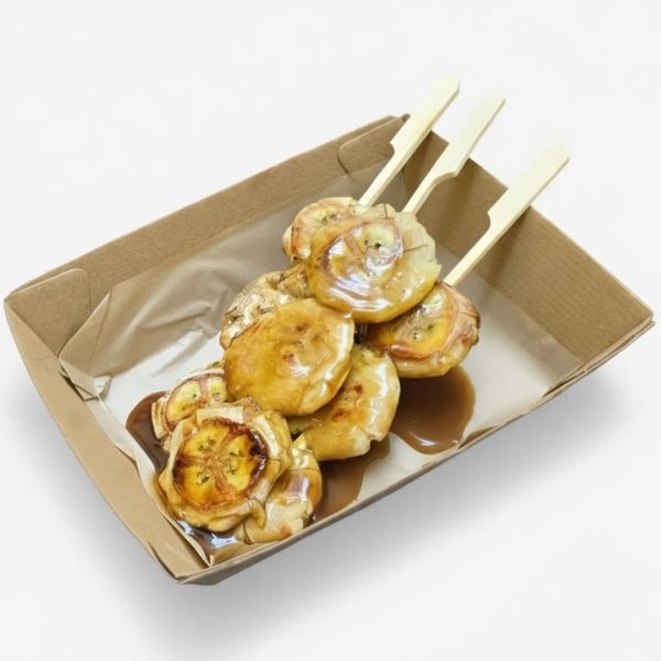 Grilled banana sticks with coconut caramel sauce